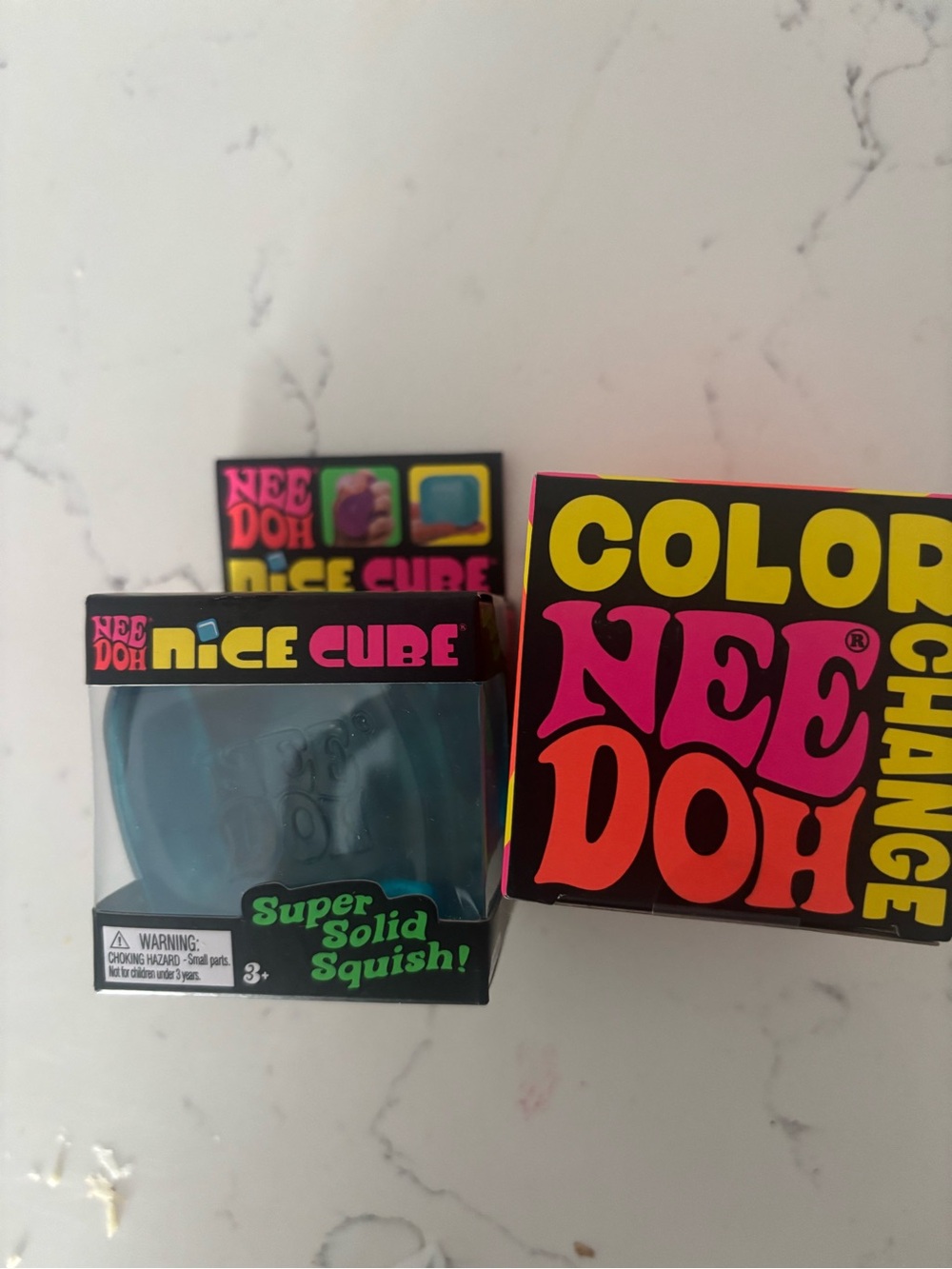 NeeDoh Color Change yellow and Nice Cube - Blue bundle